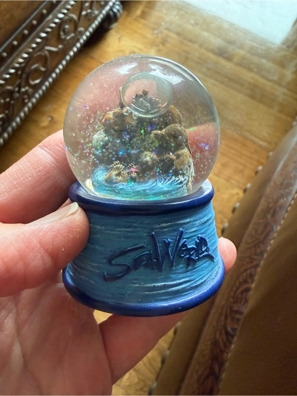 Tiny vintage Sea World snow globe 2 1/2”